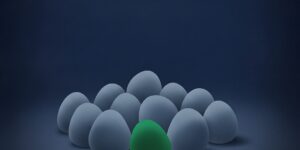 Editorial illustration of an asymmetric cluster of ten matte navy ovoid forms with one emerald ovoid sitting forward as the focal piece for the Pipeline CRM 2026 best pipeline CRM comparison